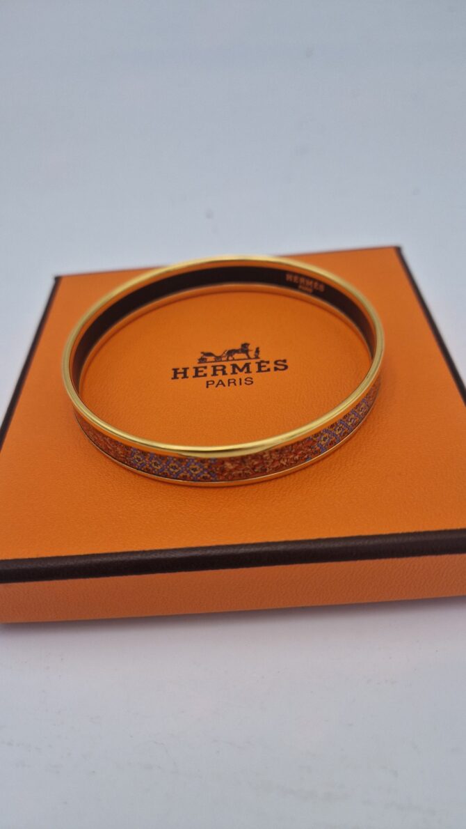 Bracelet HERMES émaillé, livré dans sa boite. Etat parfait