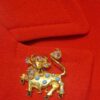 Broche pendentif christian lacroix taureau