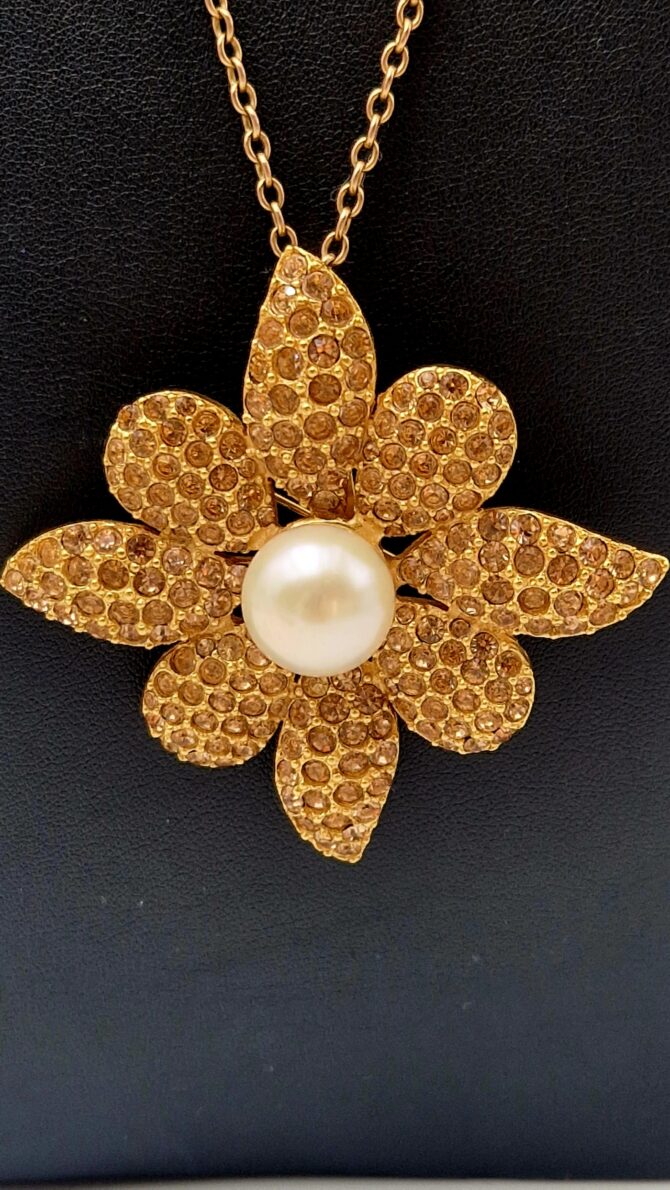 Broche pendentif Yves Saint Laurent en métal doré