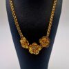 Collier Roses Yves Saint Laurent en métal doré