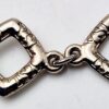 Bracelet Yves Saint Laurent en perles, strass et métal argenté