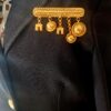 broche celine globe arc de triomphe