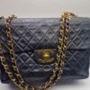sac chanel timeless jumbo en agneau noir matelassé