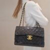 sac chanel timeless jumbo en agneau noir matelassé
