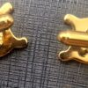 Boutons de manchette Céline dorés, dos