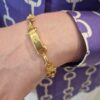 Bracelet vintage Céline – Chaîne torsadée en métal doré.jpg