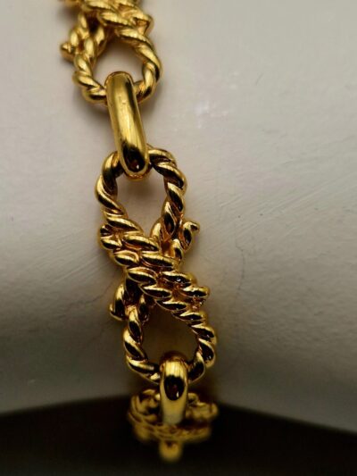 bracelet Bracelet vintage Céline – Chaîne torsadée en métal doré.