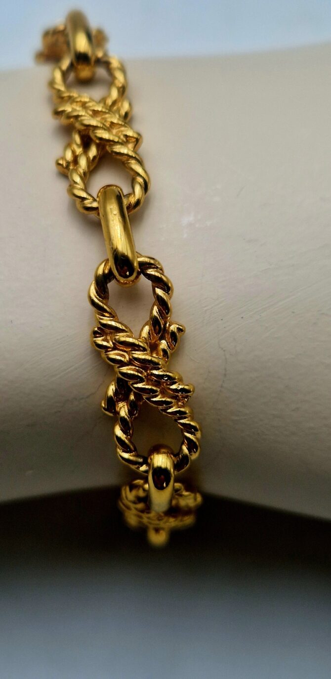 bracelet Bracelet vintage Céline – Chaîne torsadée en métal doré.