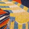 drap de bain Hermès représentant les parasols de deauville - détails des motifs rayés