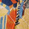 drap de bain Hermès représentant les parasols de deauville -détail des parasols alignés sur le sable avec bord de mer en arrière plan