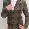 Veste Ralph Lauren en laine à carreaux vert et brun, made in Italy, état neuf. EN : Ralph Lauren wool check blazer in green and brown, made in Italy,