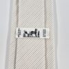 cravate-hermes-coton-blanc-rayure-gris-labe